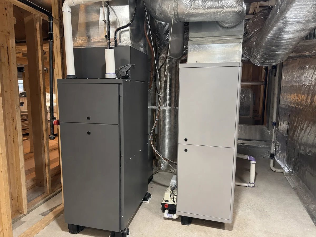 High-efficiency furnace and matched air handler installed side by side